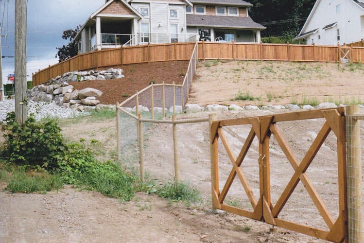 Custom wood fence design 34